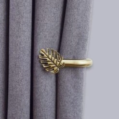 Mix And Match Antique Brass Equatorial Leaf Pair Of Holdbacks